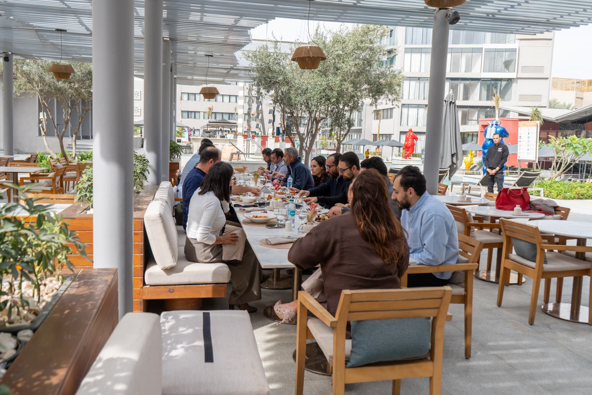 Leadership team dining together outdoors